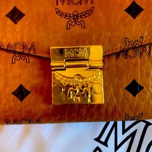 MCM Tracy crossbody bag Comes with Dust bag.